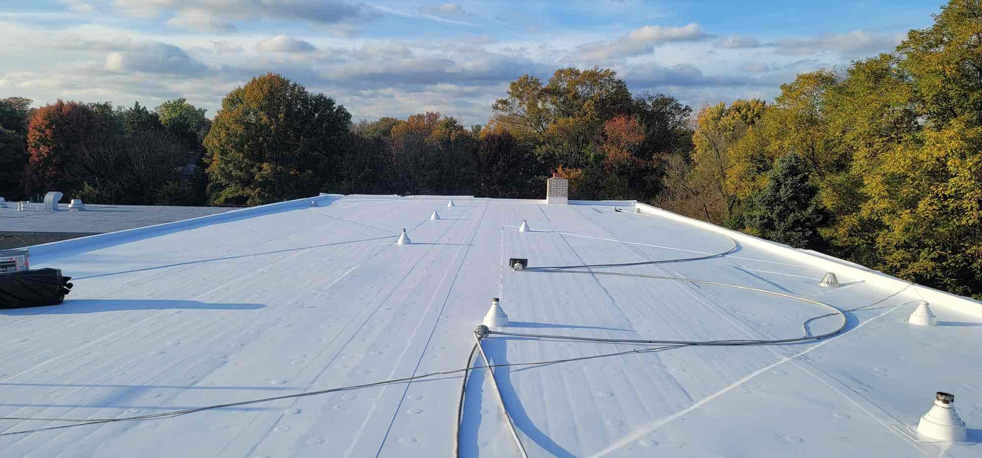 Roof Installation using Silicone TPO by ExteriorPros