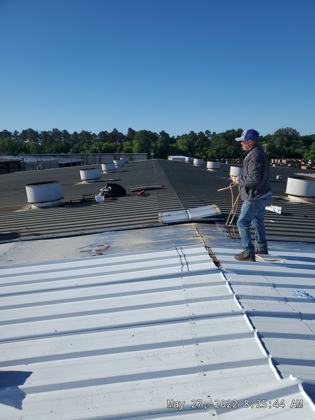 Commercial Roofing Installation using Aluminum Roofing panels by Hostetler Roofing