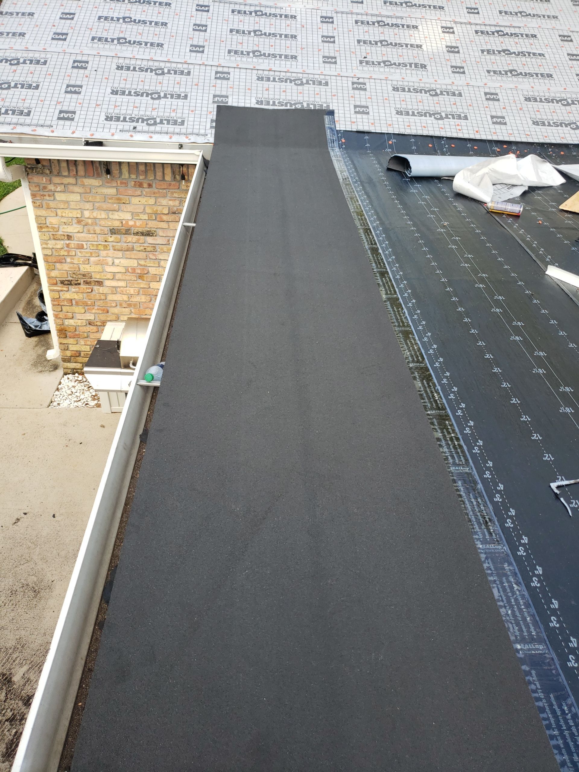 Residential Roofing Installation using Roof Replacement by American Roofing & Construction LLC