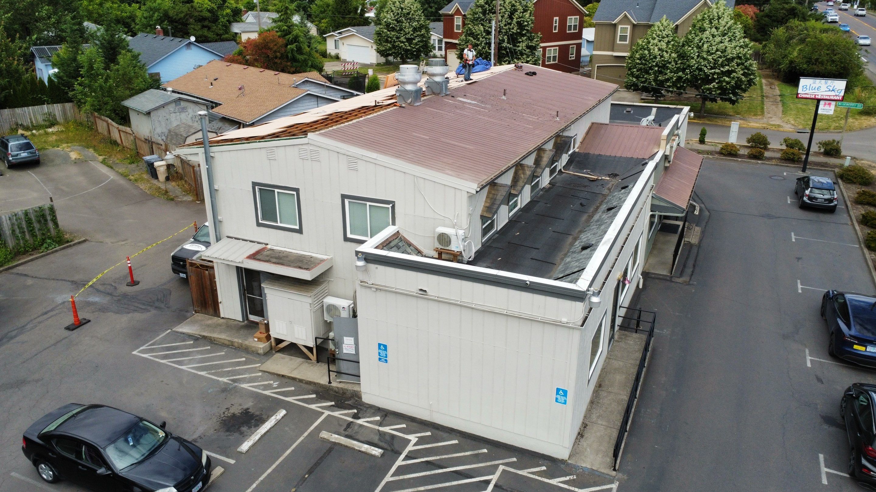 Commercial Flat Roof Installation using Bruce and Dana Snap Lock Metal (Color: Brown) by Orezona Building & Roofing Company, Inc.