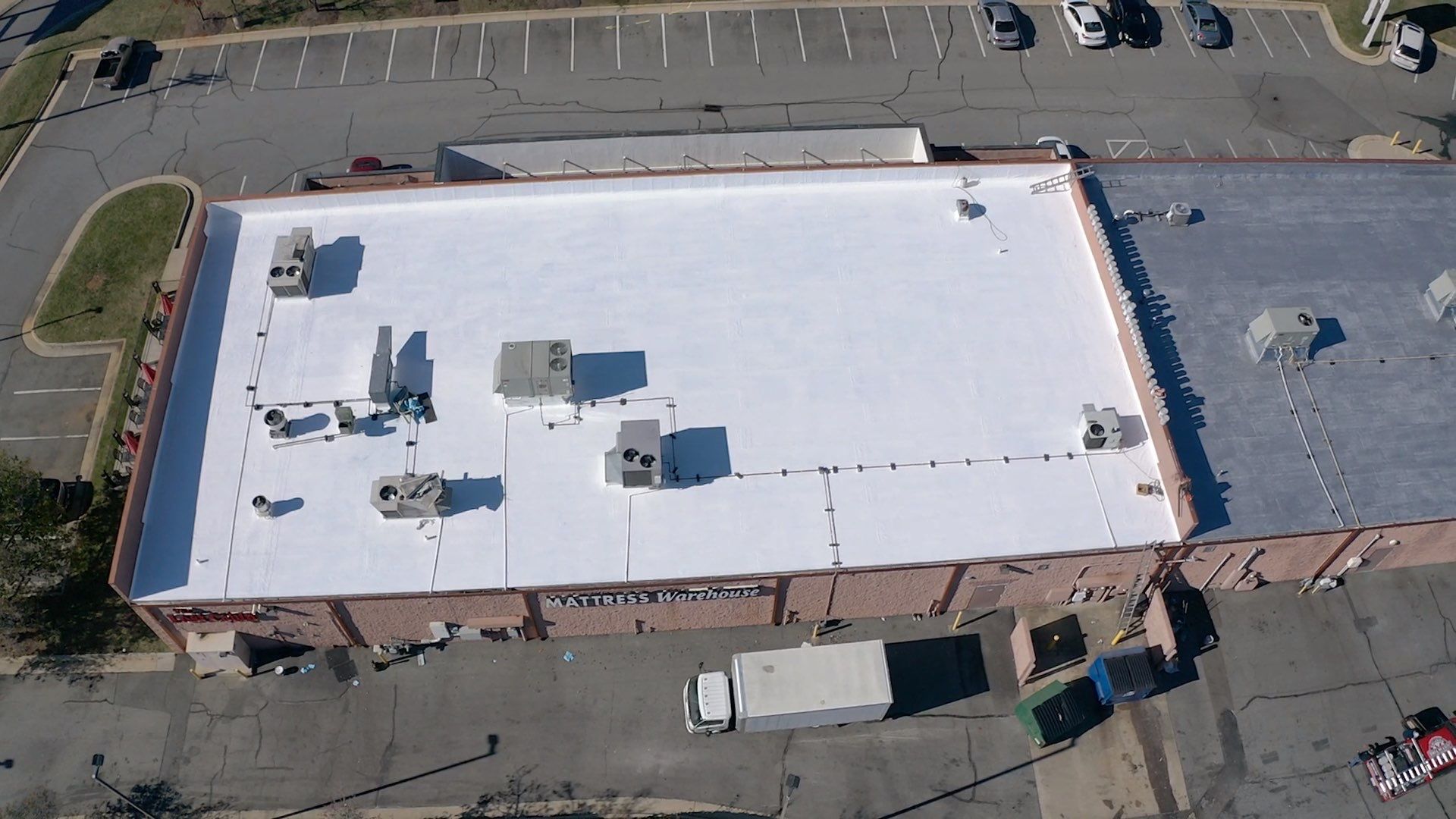 Commercial Coating using Poly Urerthane and Silicone Coating by Just In Time Roofing and Restoration