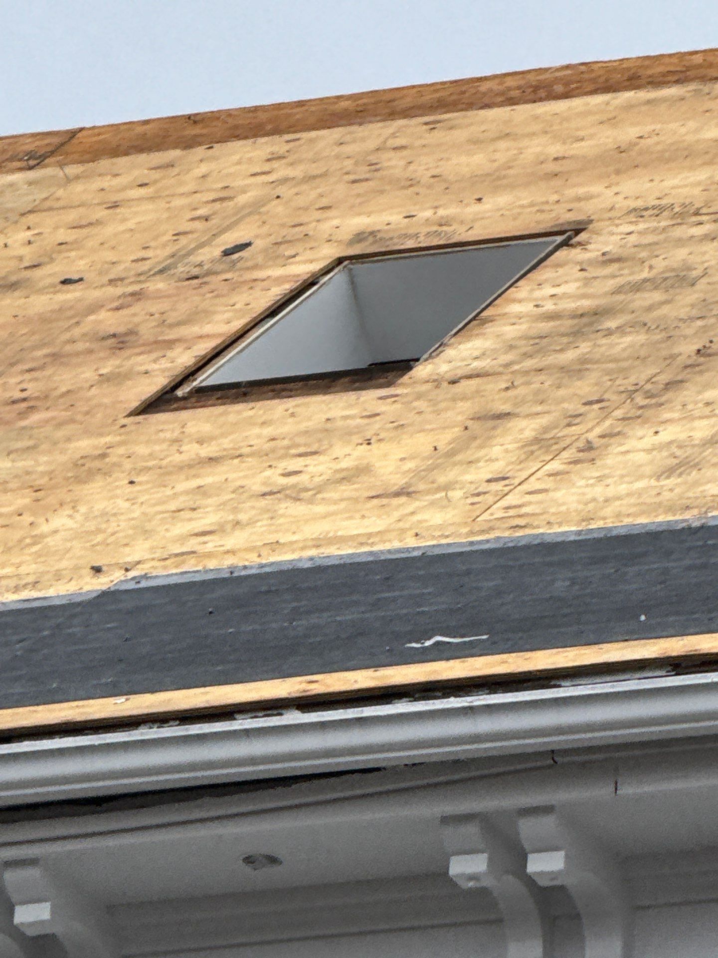 Newburyport Complete Roof Replacement with Solar Venting Skylight by Mighty Dog Roofing of Greater Middlesex County