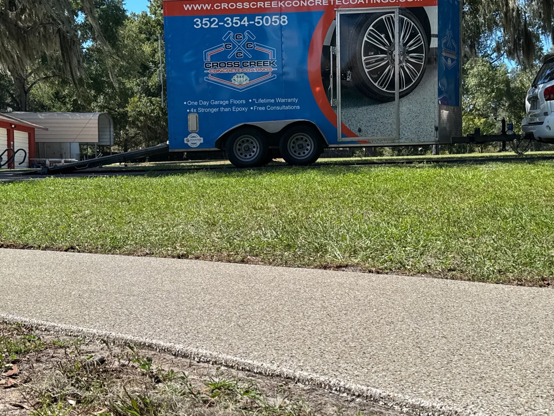 Garage and Sidewalk Project in Keystone Heights, FL in Pebble Beach by Cross Creek Concrete Coatings