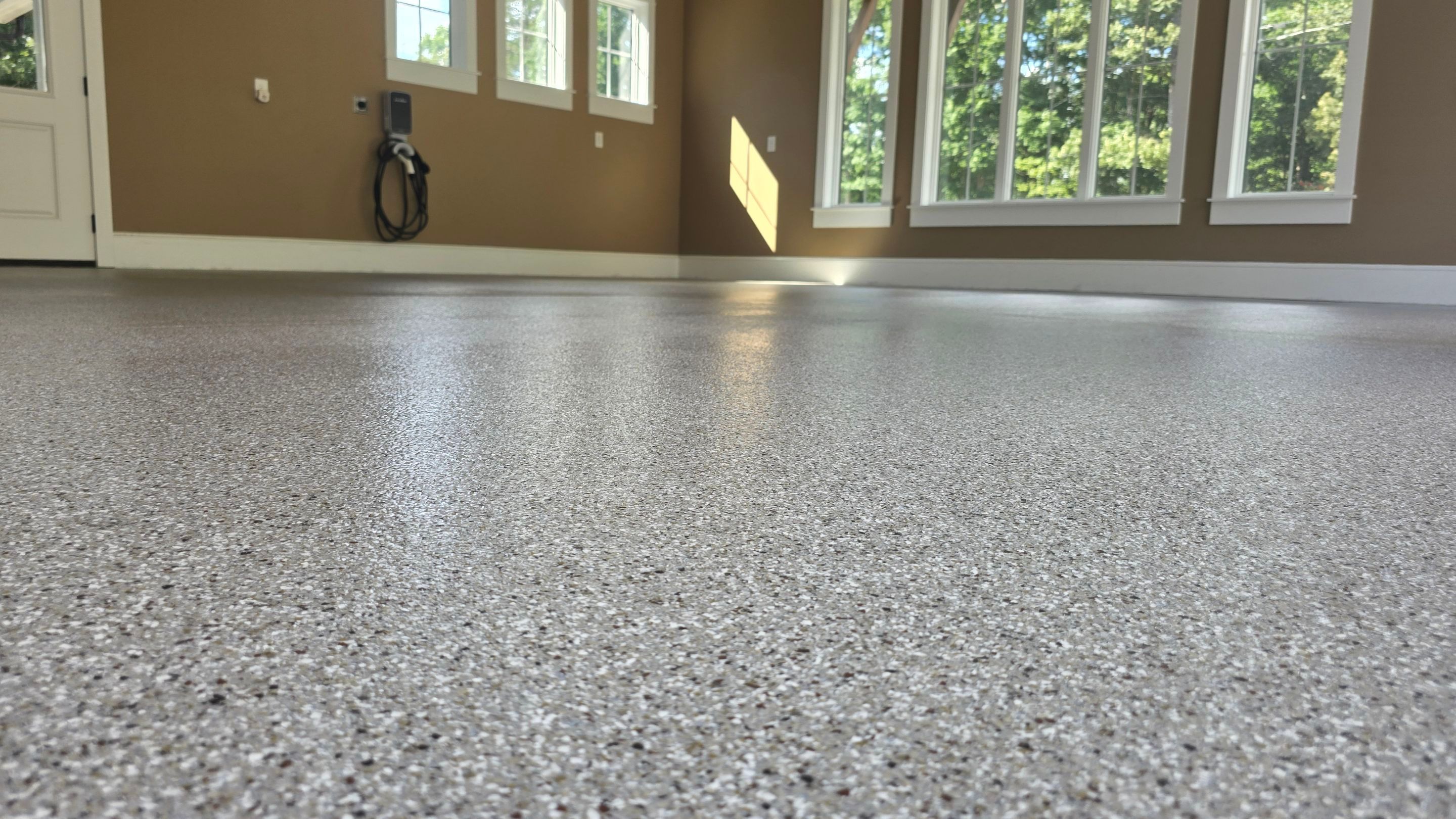Front Porch & Garage Using Creekbed by Elite Floor Solutions