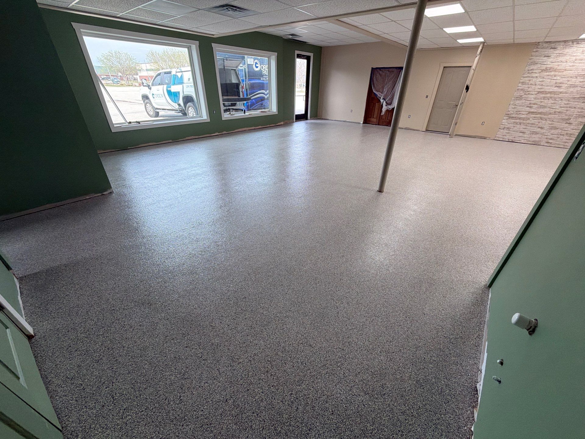 Commercial Epoxy Flake Floor Installation and Concrete Refinishing in Montague by Gordon Painting