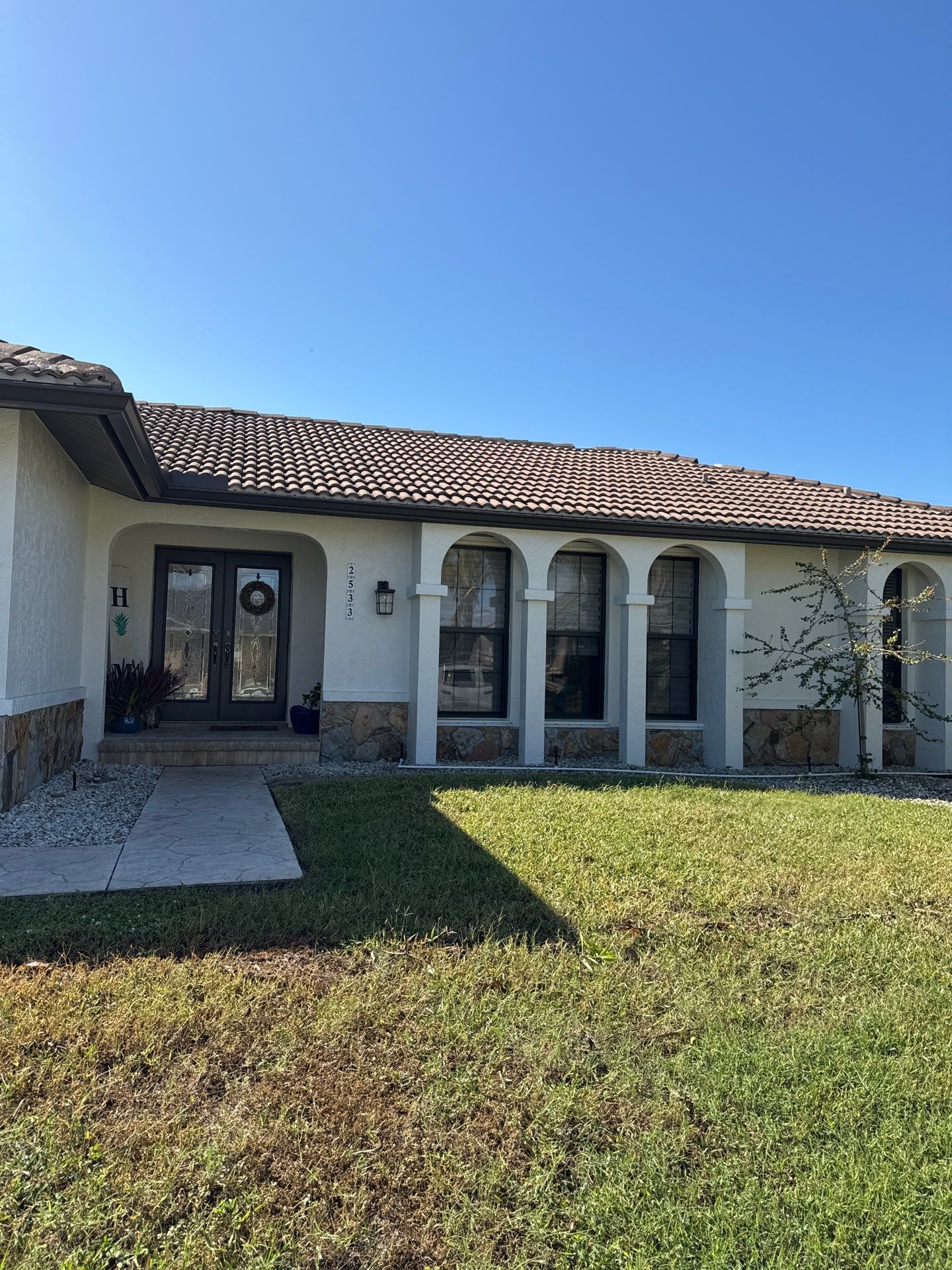 Black Seamless Gutters for Modern Homes in Punta Gorda by Gutter Professors