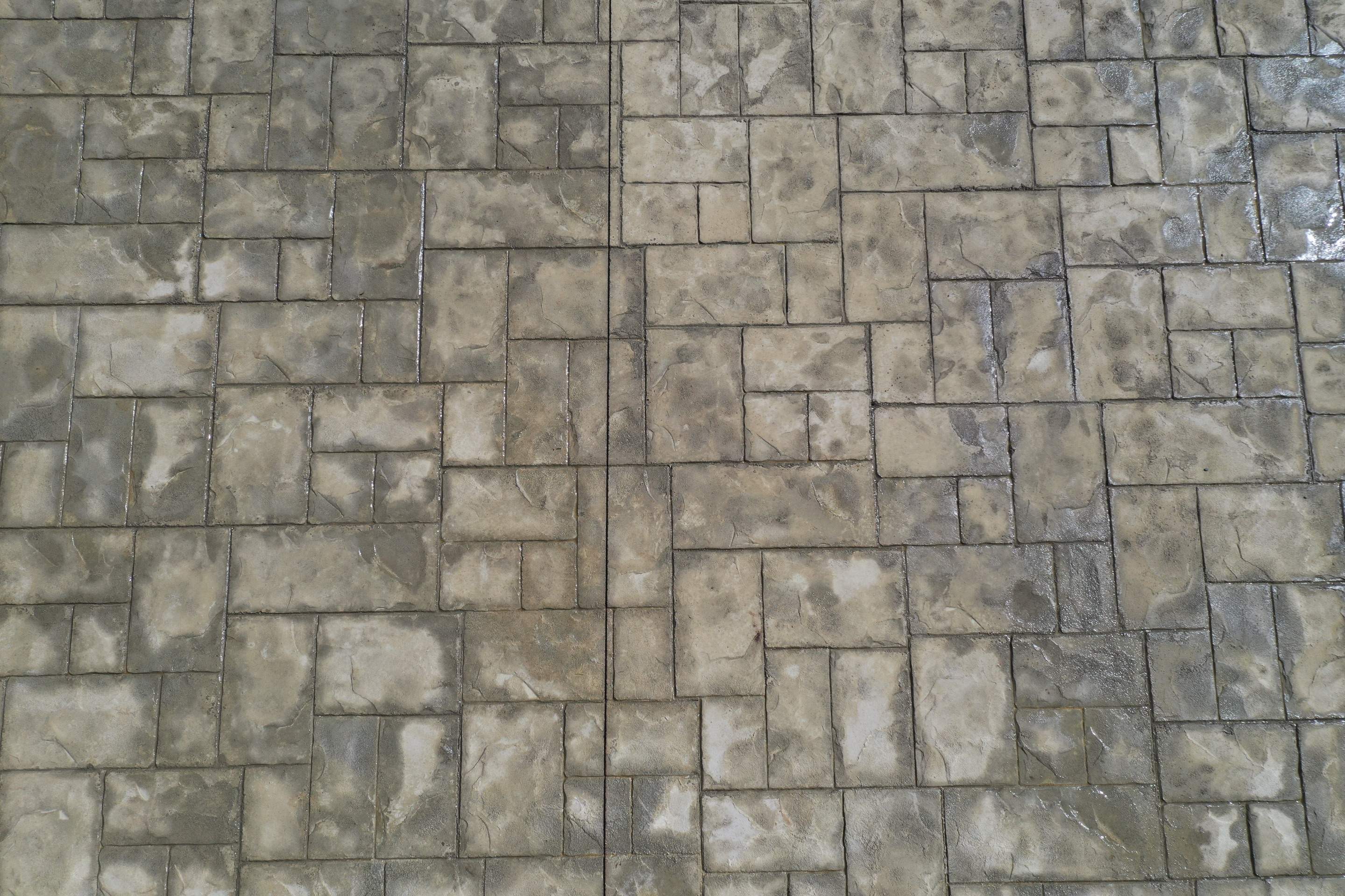 Benedict | Stamped Concrete Back Patio by Jireh Asphalt & Concrete Inc 
