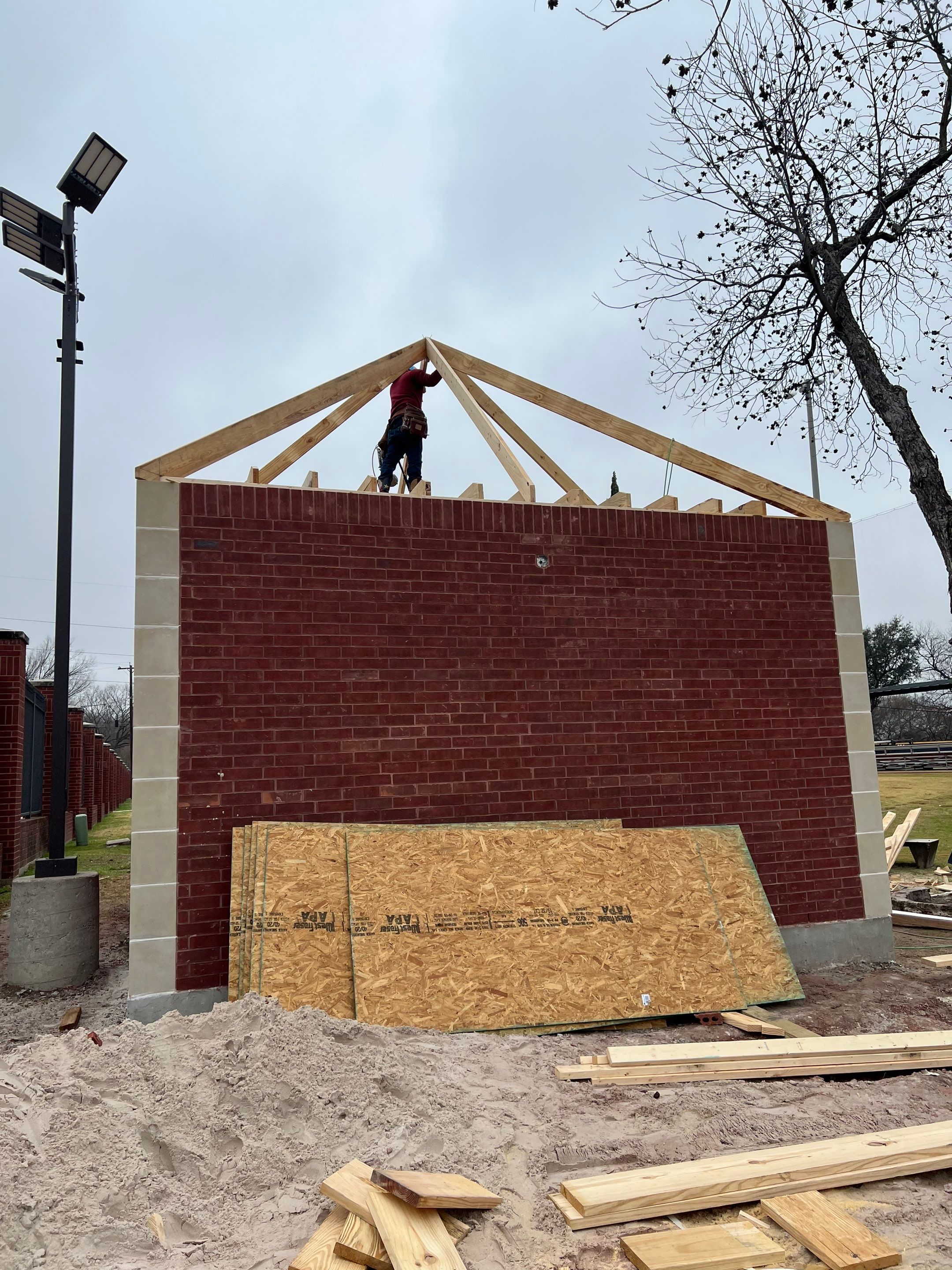 Commercial Roofing Installation using Standing Seam Metal Roofing by Harvey Roofing & Construction