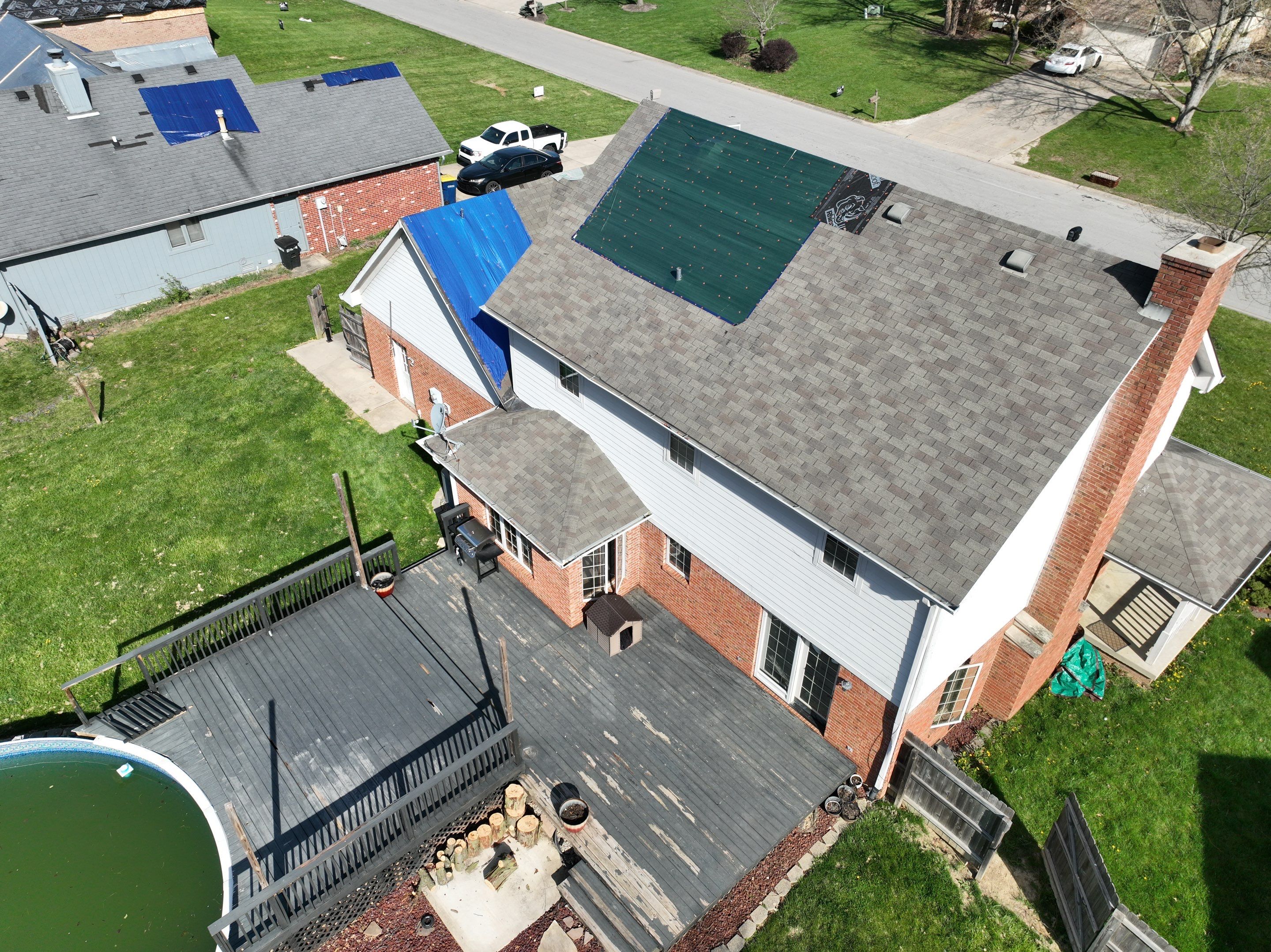 Tornado damage in Whiteland. Roof replacement, James Hardie siding, exterior paint, gutters, windows, doors by 317 Roofing & Restorations