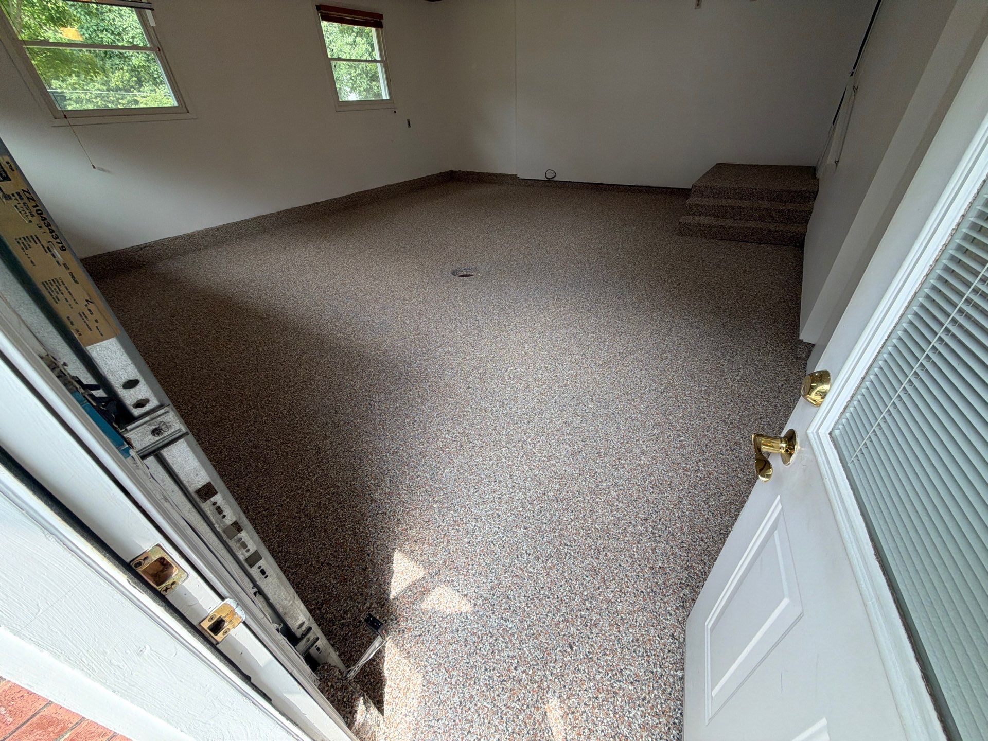 Multi-Colored Epoxy Flake Garage Floor Installation in Fruitport by Gordon Painting