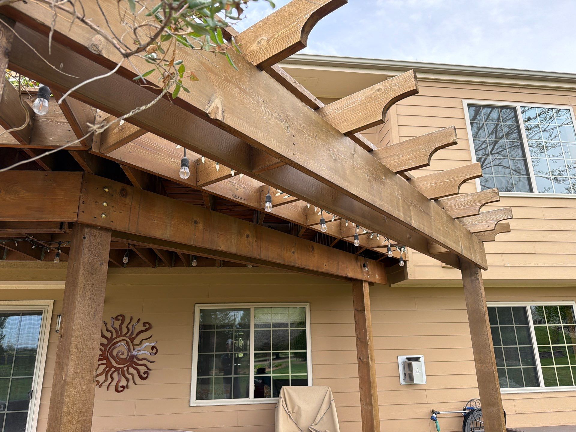 Tiered Wood Deck and Pergola Refinishing in Sioux Falls by Select Painting, Coatings & Garage Cabinets