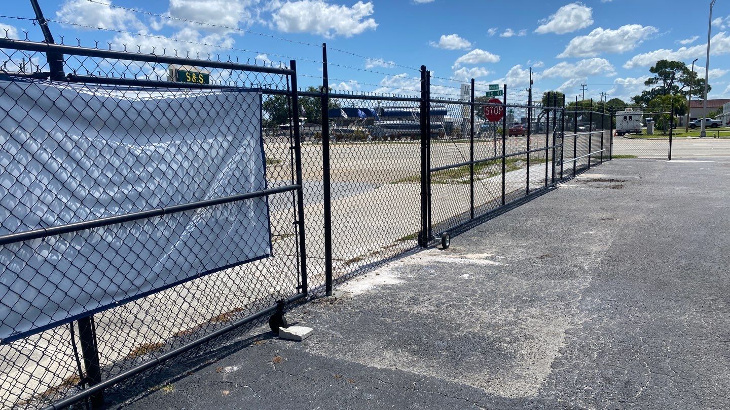 Parrish, FL 6+1 Black Commercial Chain-Link Fence by Asap fence and gates, LLC