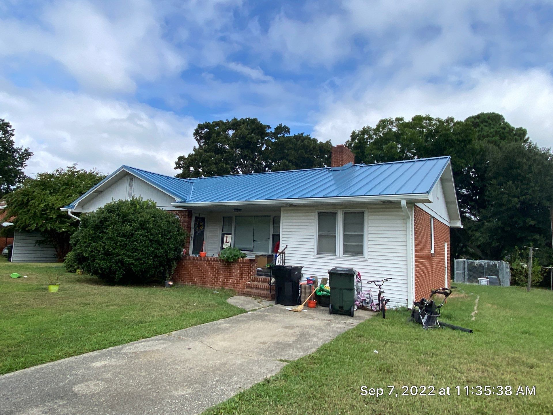 Carolina Blue Standing Seam Roof by Just In Time Roofing and Restoration
