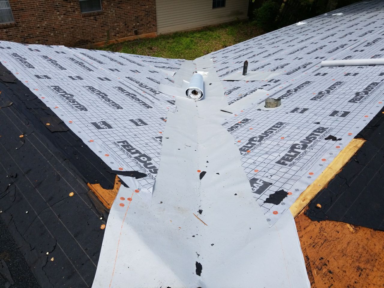 Residential Roofing Installation using Roof Replacement by American Roofing & Construction LLC