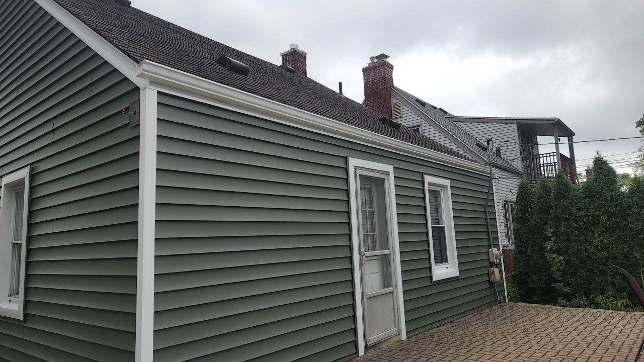 Siding Replacement using CertainTeed Restoration Classic D5 Forest Green by 180 Contractors