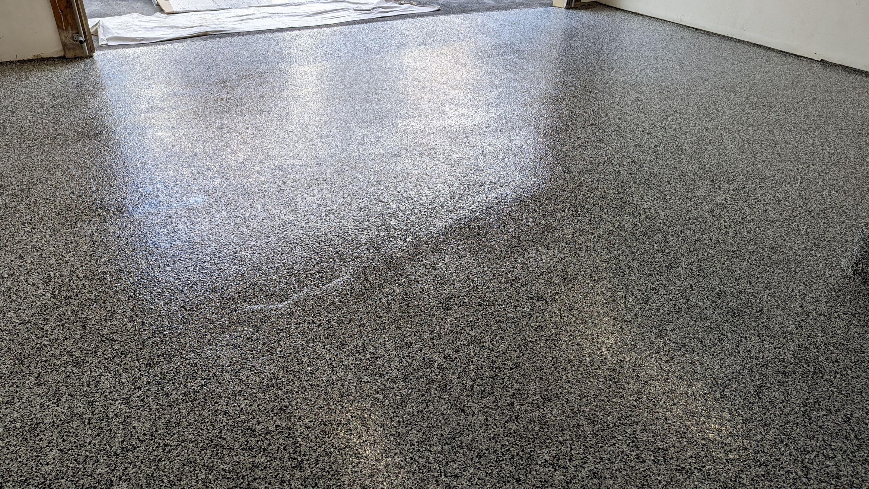 Garage Transformation using Domino for Garage and Pecan for Pool Deck by Croc Coatings, LLC