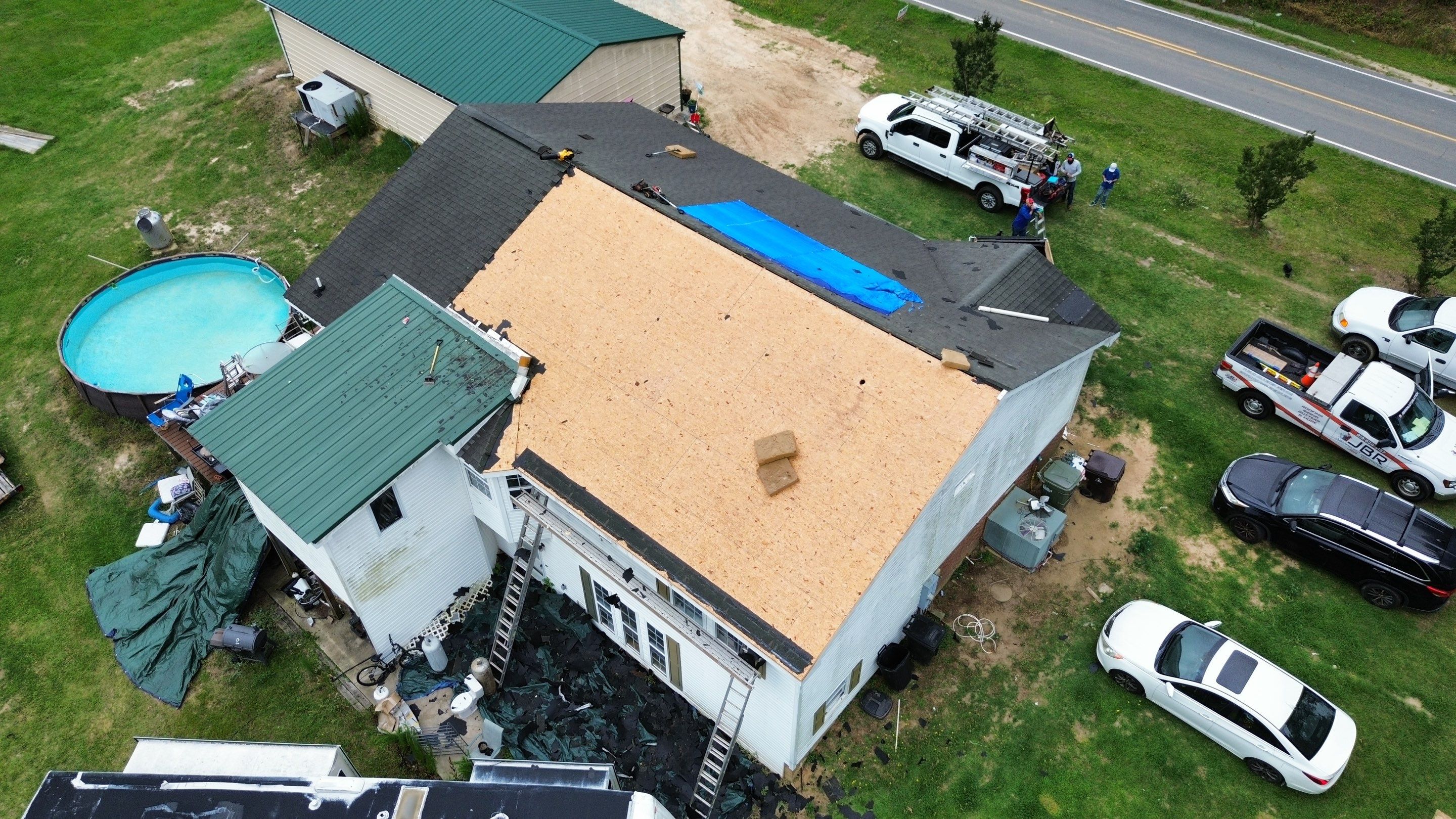 Roof replacement by wind damage by Just Brilliant Restoration JBR