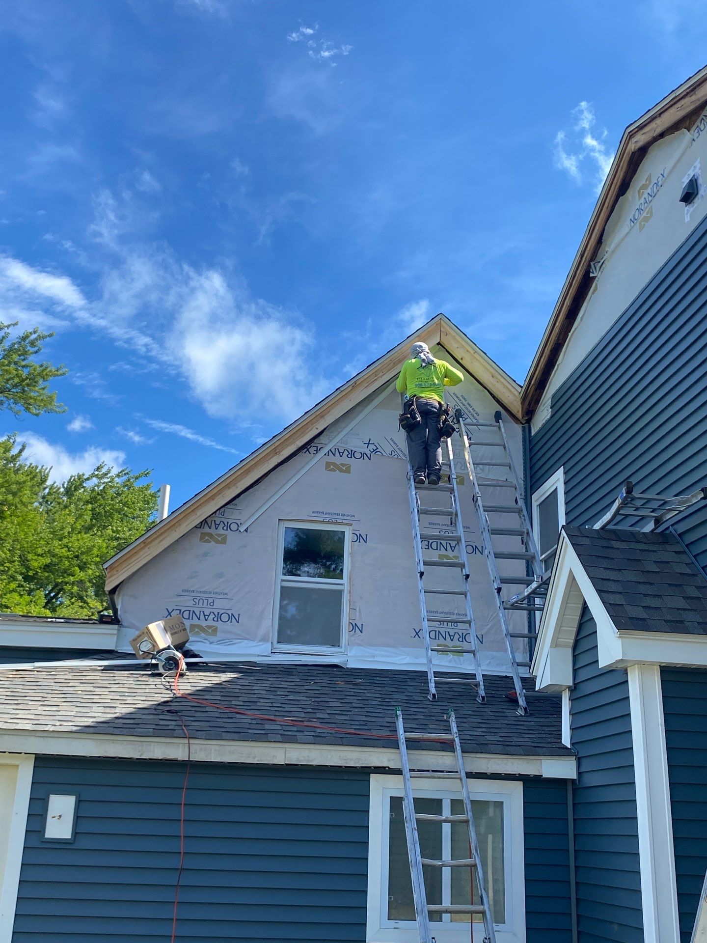 Premium Mixed-Material Siding Installation in North Billerica, MA by Mighty Dog Roofing of Greater Middlesex County