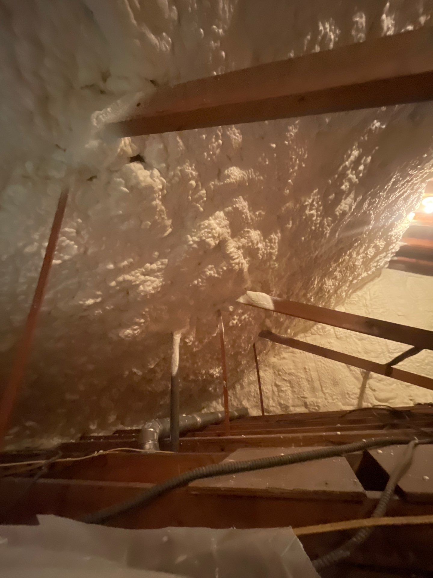 Attic Insulation using open cell spray foam by NYS Foam & Energy