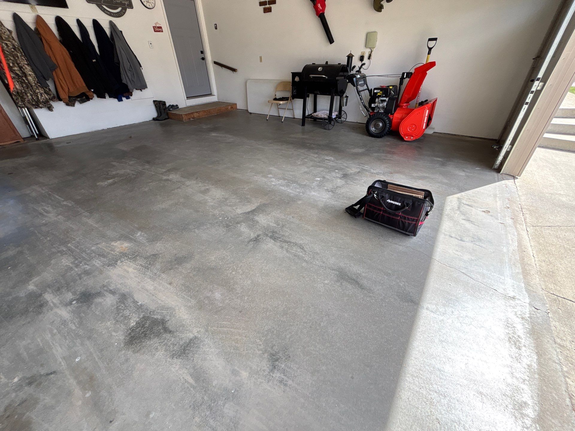 Smoke Flake Garage Floor Coating in Dell Rapids by Select Painting, Coatings & Garage Cabinets