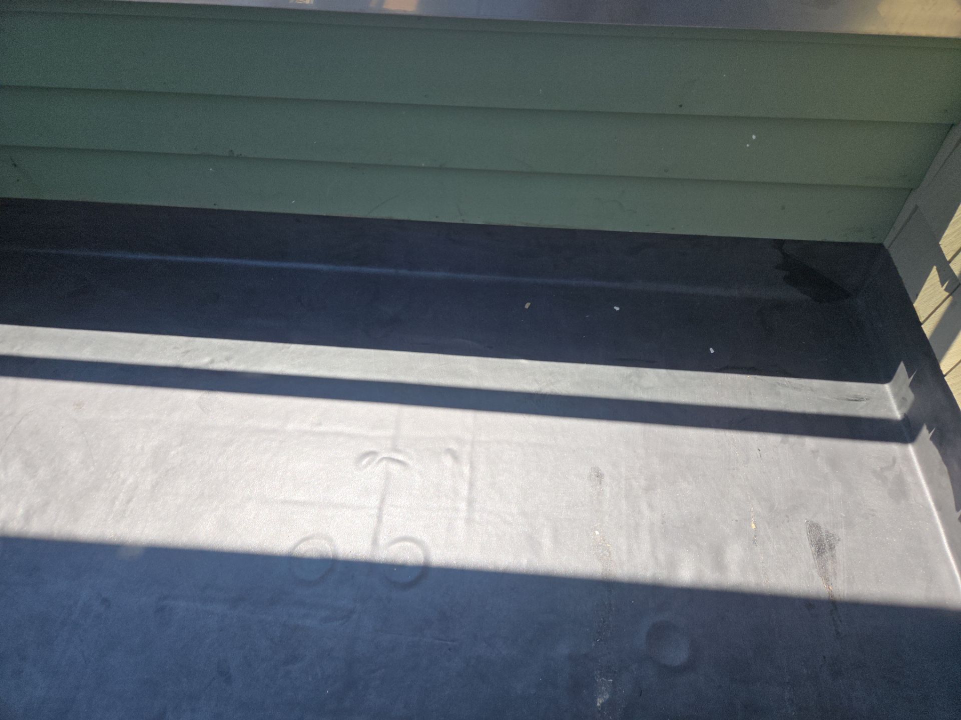 Deck Installation using Tanzite Stone Decking by A Plus Exterior