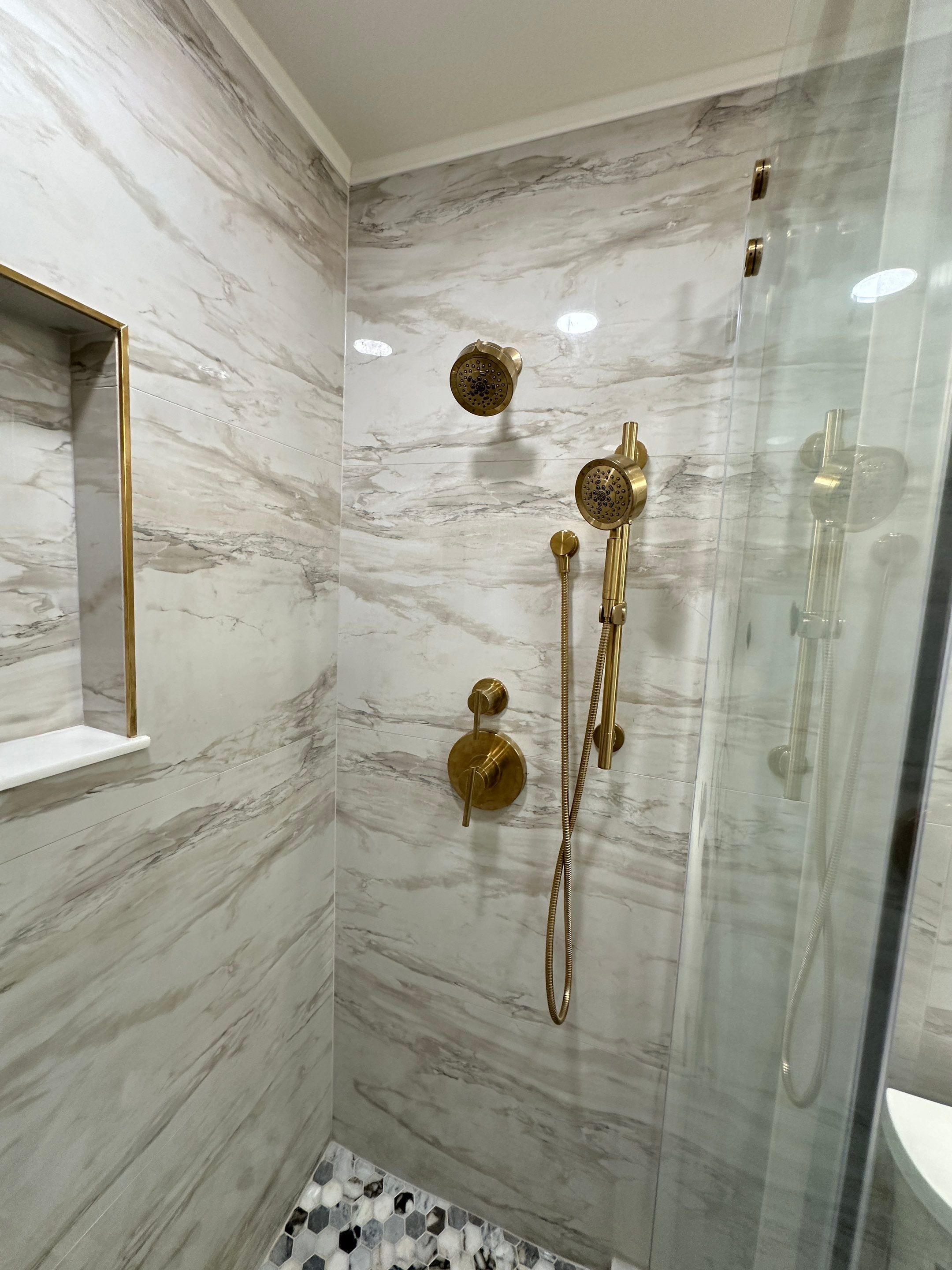 Bathroom Remodel using Tile by Home Concepts Construction