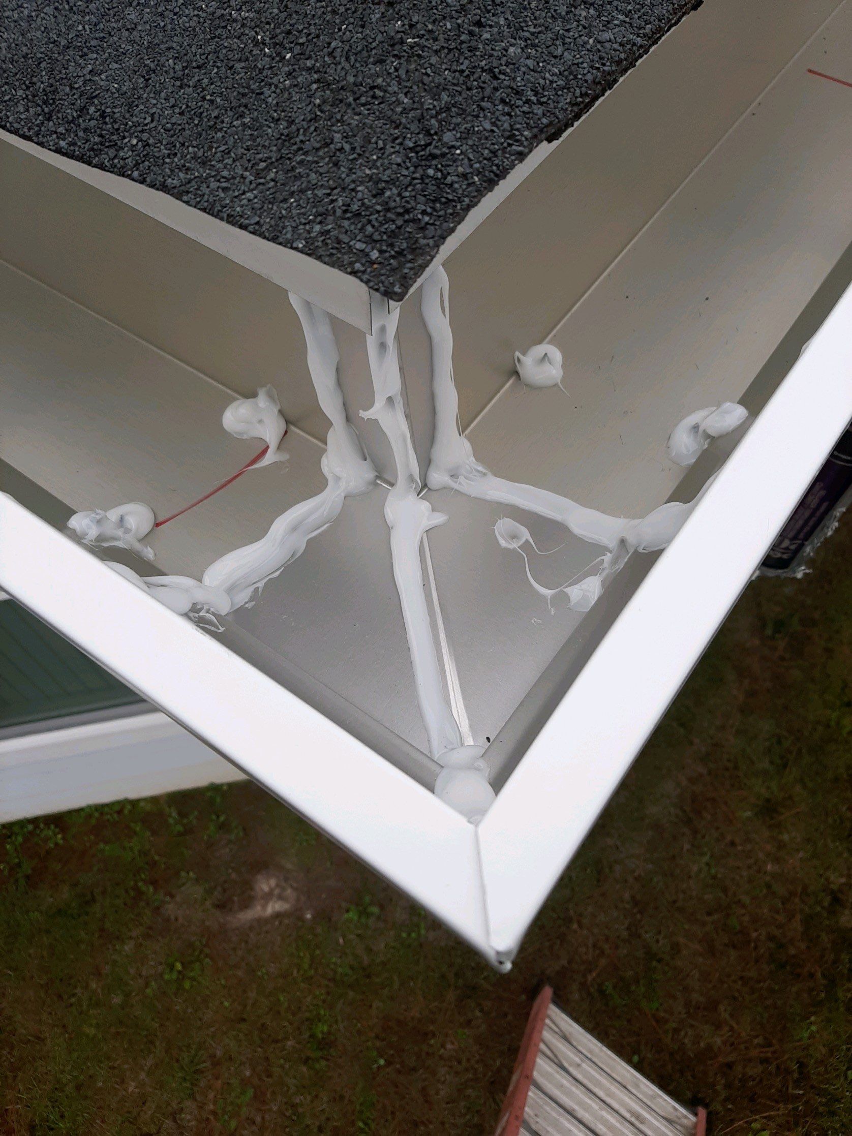Gutter Installation using White K-Style Seamless Gutters by Gutter Professors