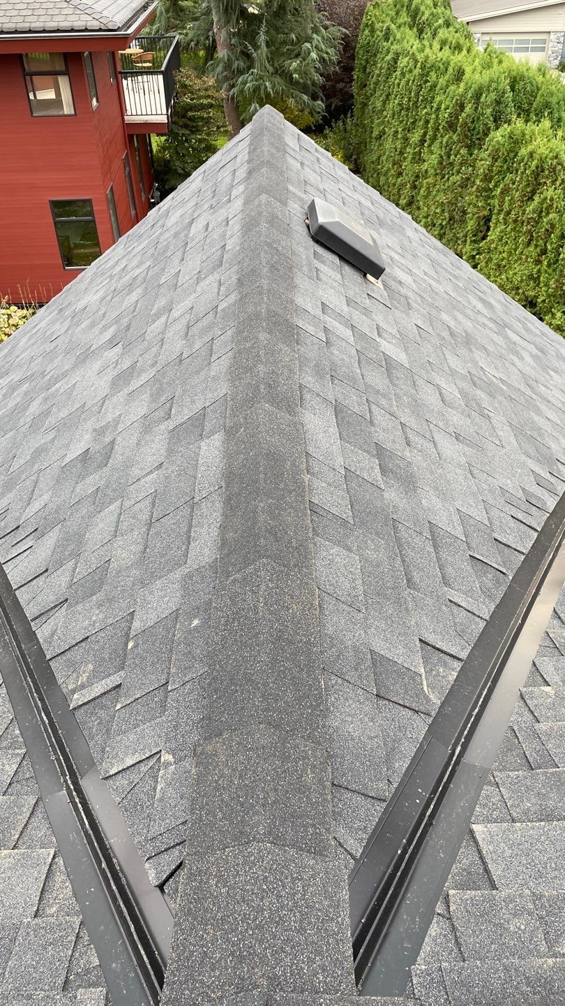 Residential Roofing Installation using Malarky Vista Midnight black by Top Notch Roofing Inc