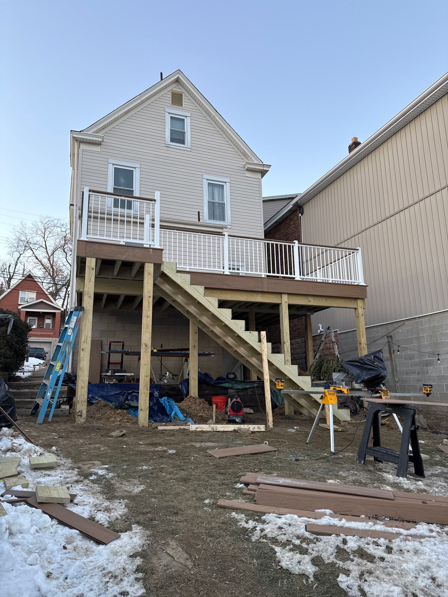 Deck and door by Cousins Roofing Siding & Decks