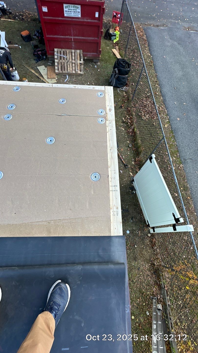 Westford EPDM Flat Roof with Gutter & Soffit/Fascia Replacement by Mighty Dog Roofing of Greater Middlesex County