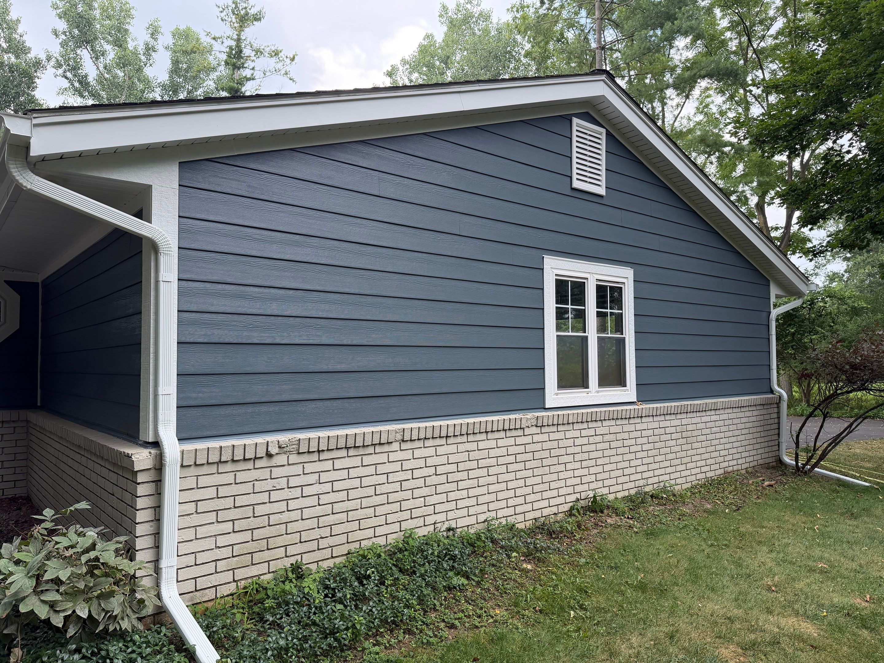 James Hardie Siding Replacement & Metal Roof by Bloomfield Construction & Restoration