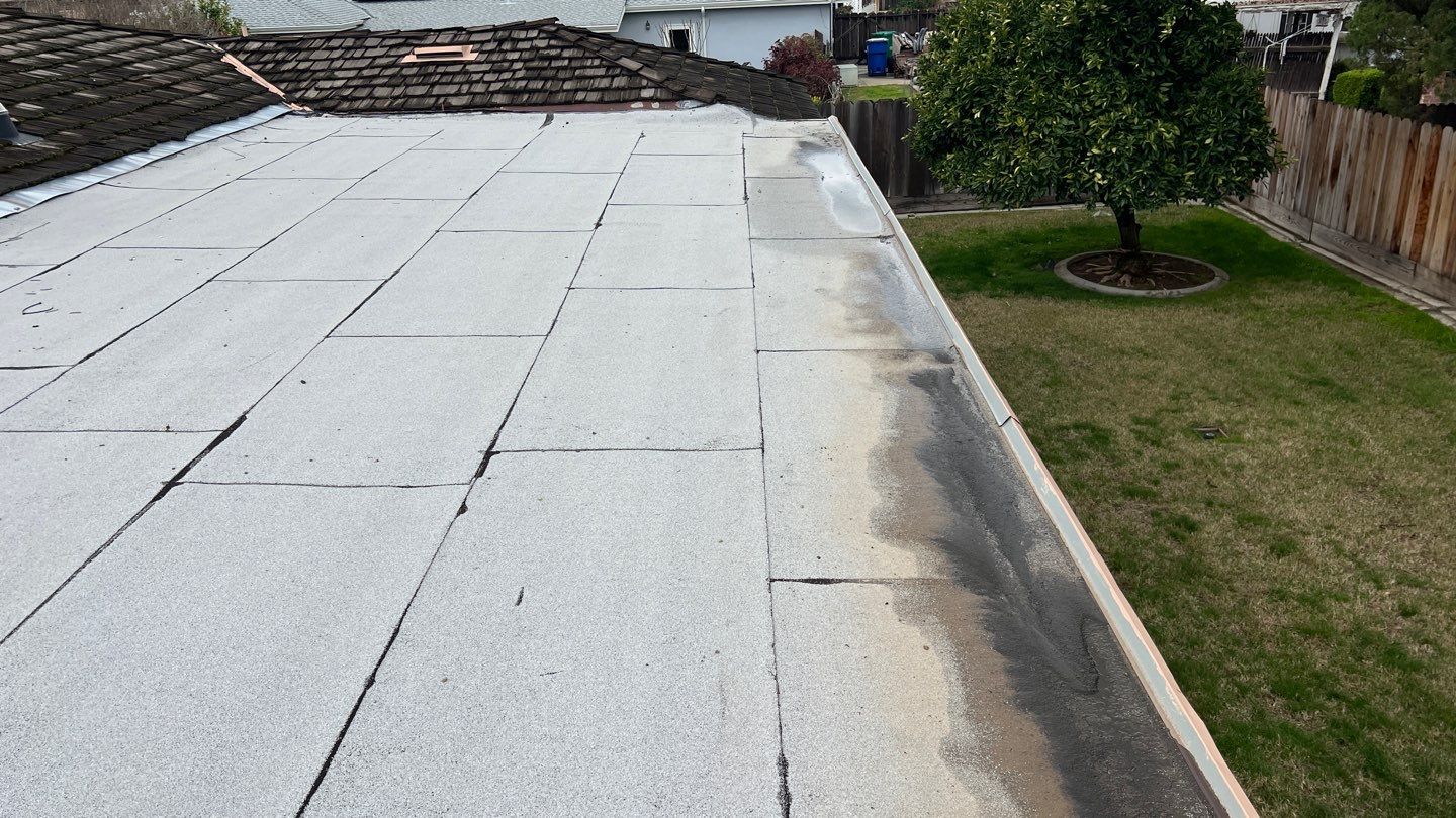 Installation of Certainteed Presidential shingles on residential house by Straight Edge Roofing Inc