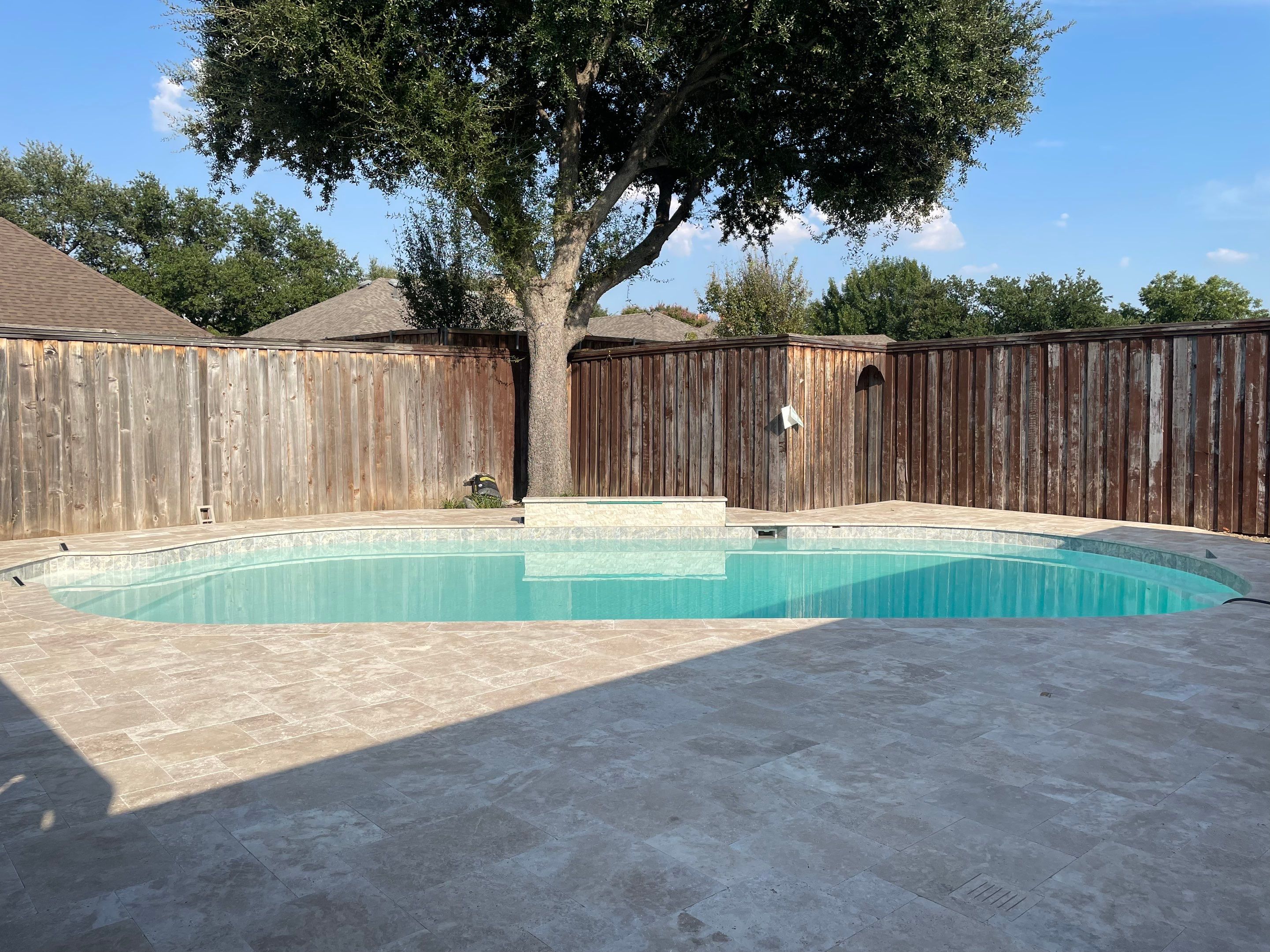 Freeform Pool Remodel with Travertine Deck by Pinnacle Pools and Spas - DFW