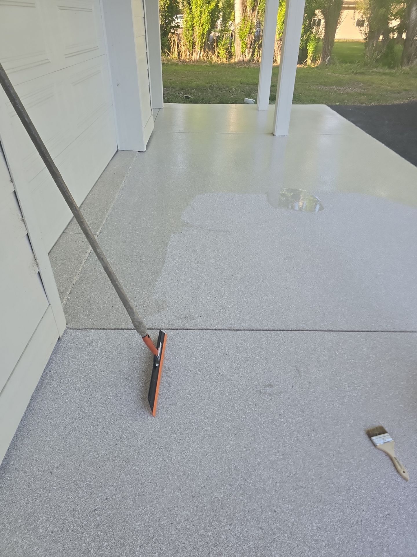 Patio Transformation with Sandstone Penntek Flooring by Croc Coatings, LLC