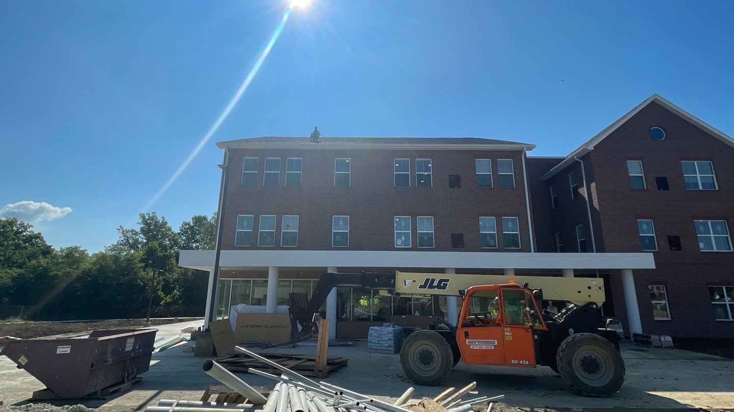 Commercial Roofing Installation using Owens Corning Duration Estate Gray by Nitro Roofing and Construction