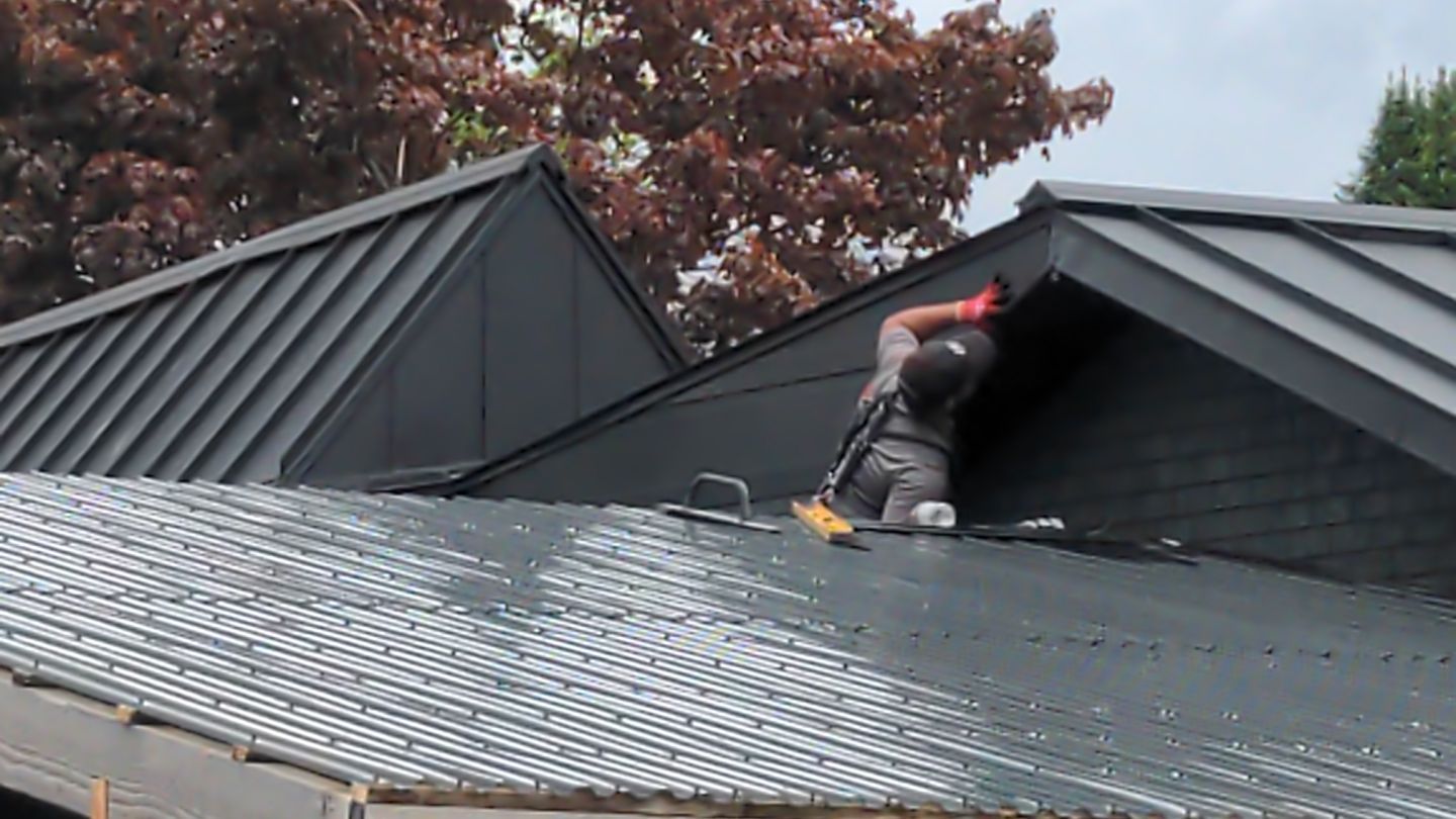 Residential Roofing Installation using 16" Standing Seam Panels by Jay Carter Roofing & Sheet Metal
