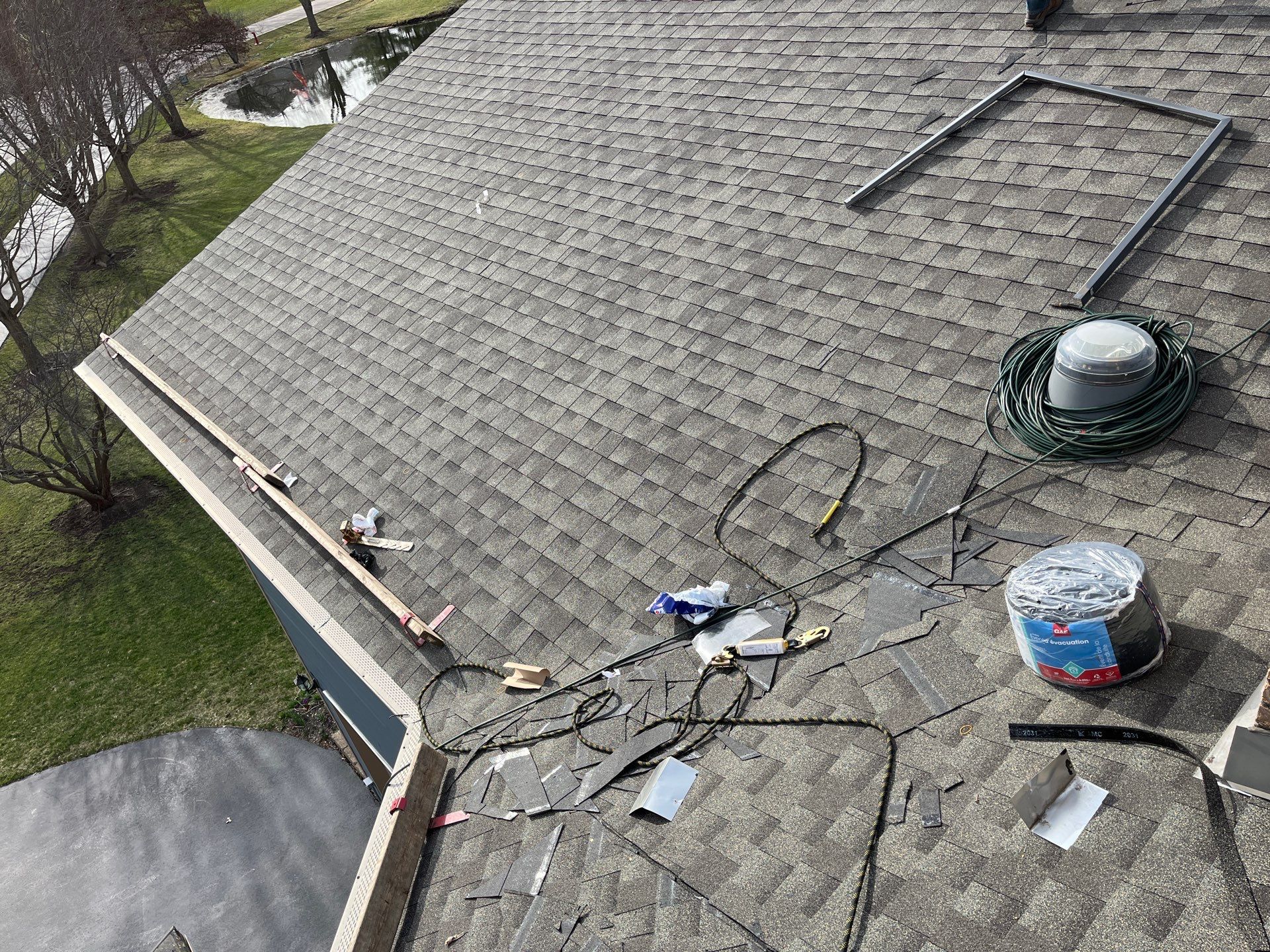 Asphalt Roof Replacement by Custom Installations