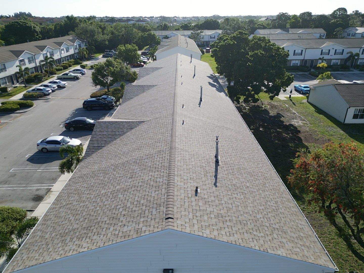 Apartment Complex Shingle Roof Replacement by Sailfish Roofing