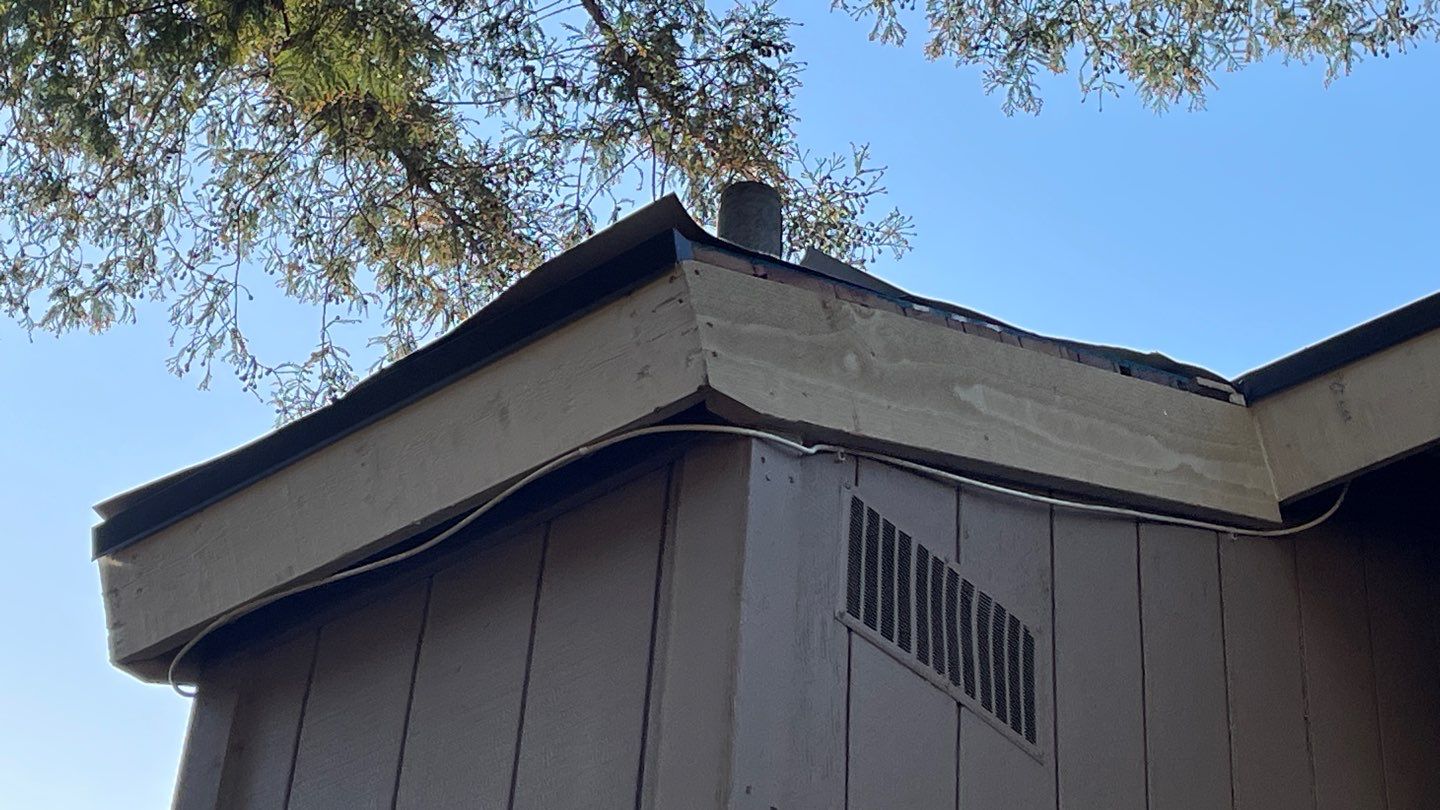 Removed tile from roof and replaced with shingles by Straight Edge Roofing Inc