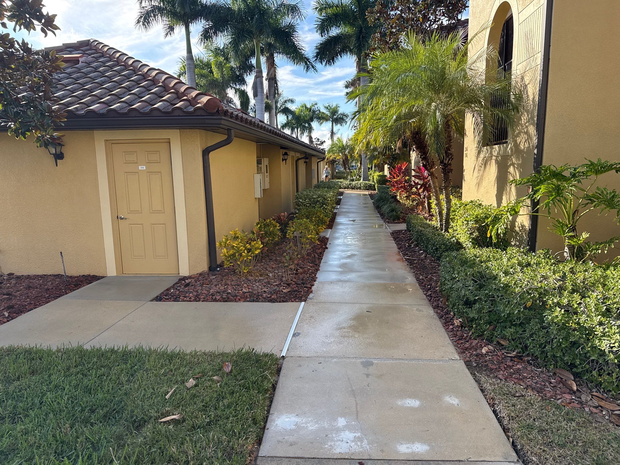 HOA Condo Concrete Driveway & Sidewalk Cleaning – River Strand Community, Bradenton, FL by Sunshine AquaWash