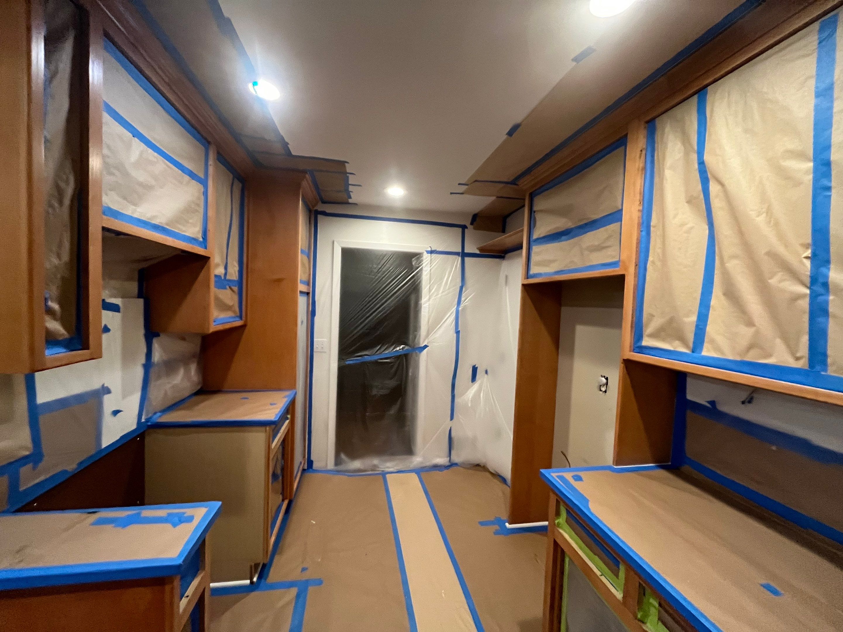 Elegant Transformation: Stained Cabinets Revamped with Sherwin-Williams Juniper by Cougar Painting