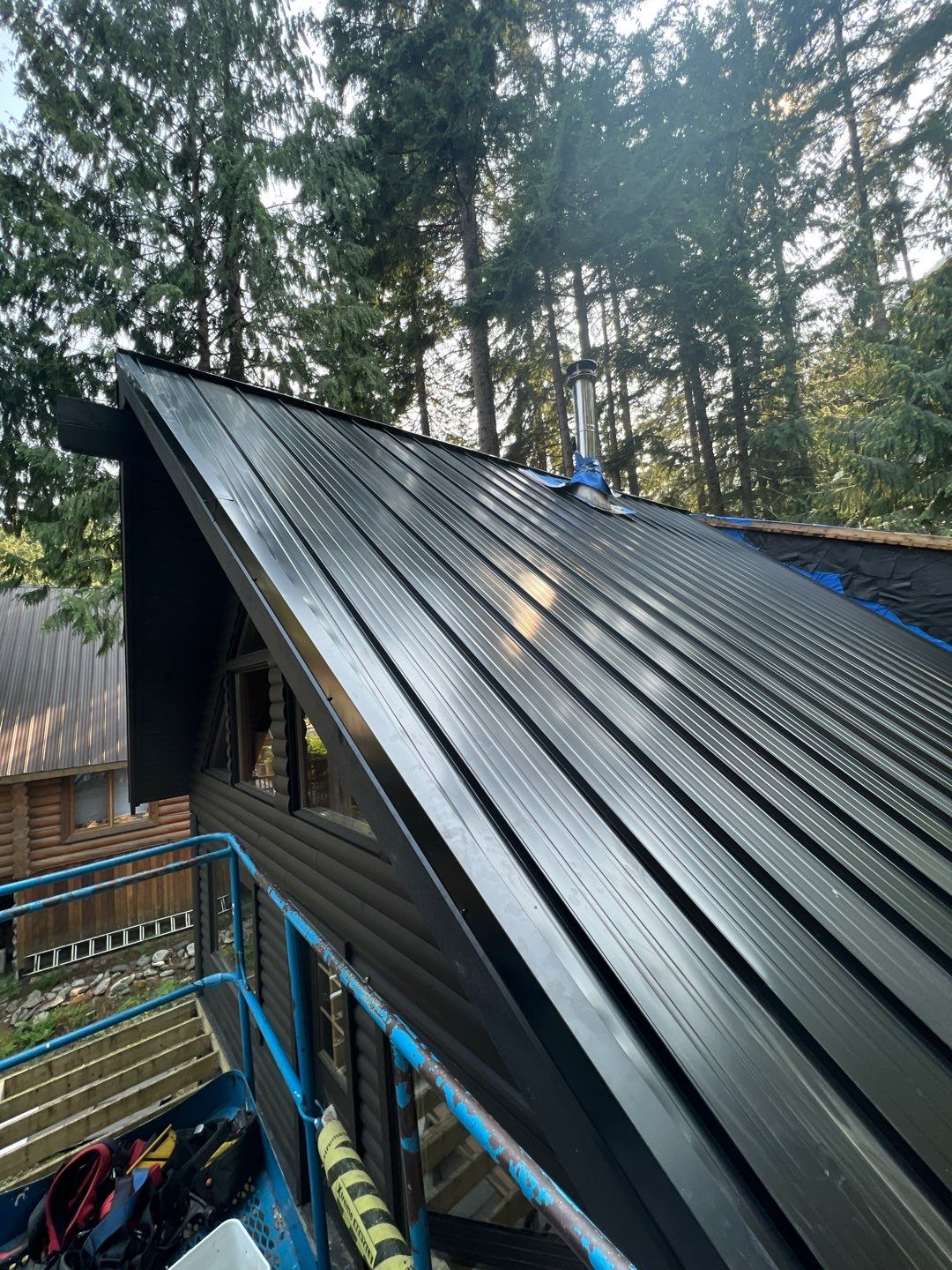 Residential ReRoofing Installation using 12" Prolok metal  by Top Notch Roofing Inc