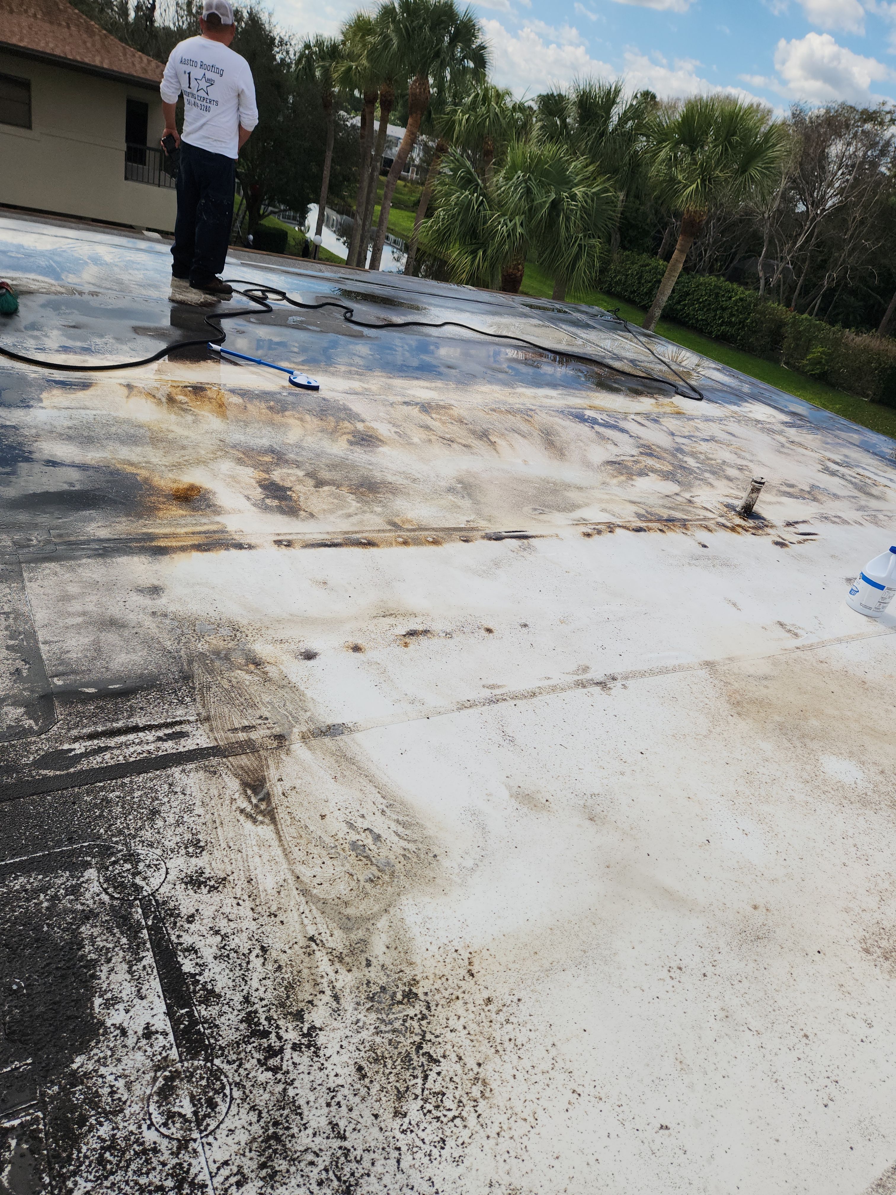 Reflective Silicone Roof Coating and Maintenance in Palm Beach Gardens by Aastro Roofing