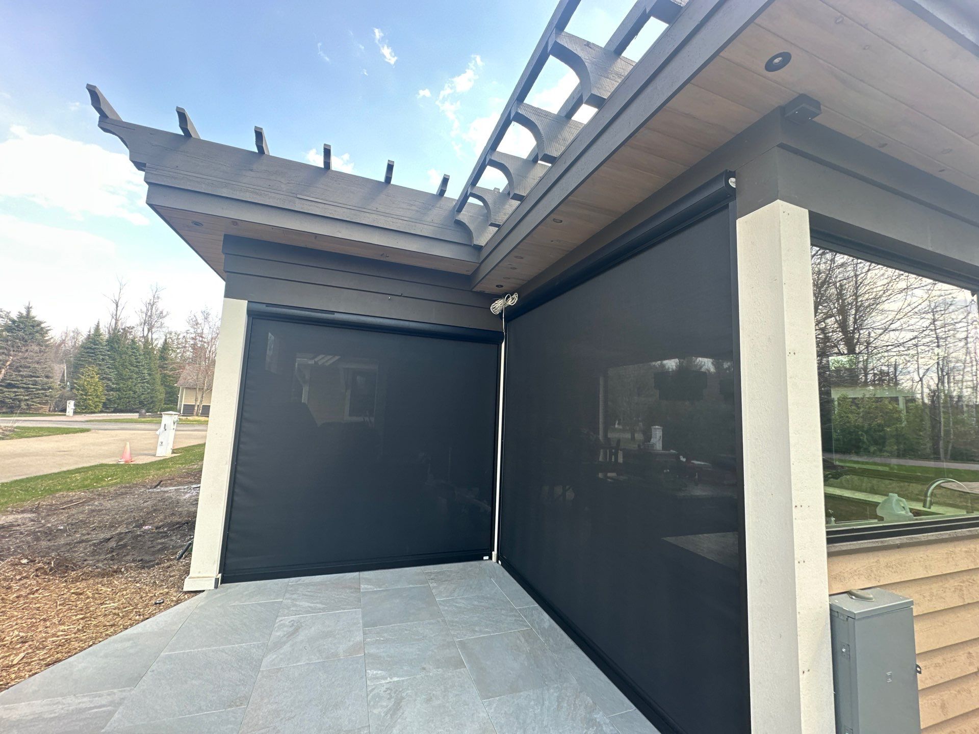 Sunesta Retractable Screen and Gutter Protection in Petoskey by Rainbow Seamless Systems