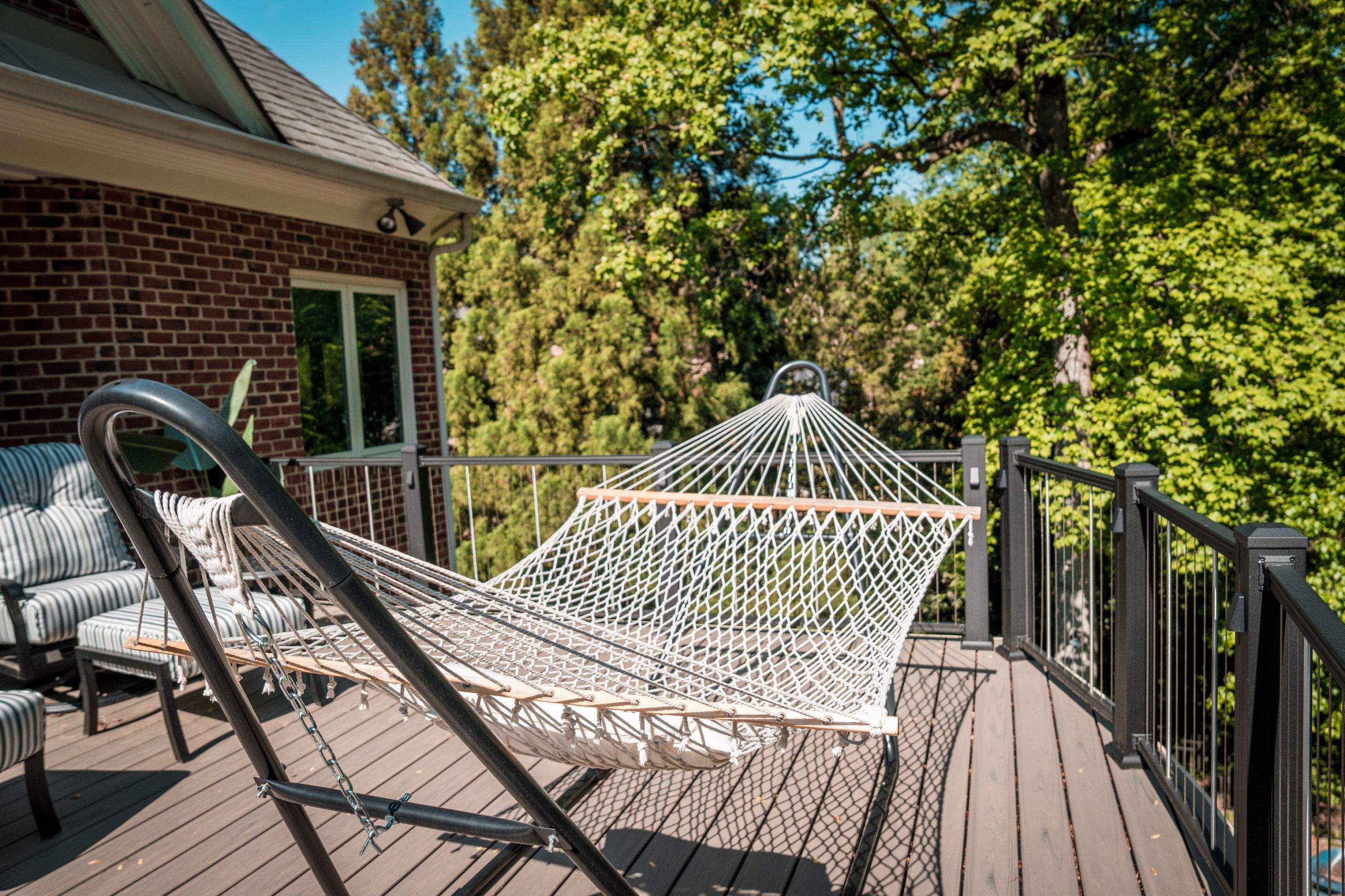 Custom Multi-Level Deck, Outdoor Kitchen & Pool Patio in McLean, VA by Sunburst Construction Inc
