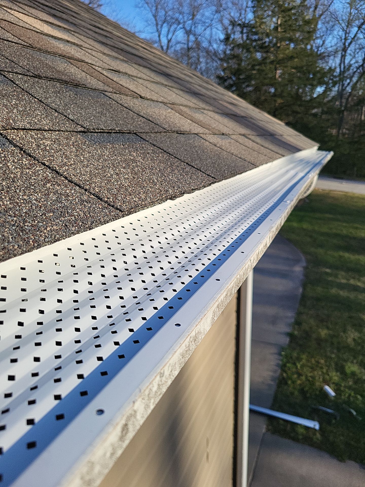 Residential Roofing & Gutter Cover Install  by Titan Commercial & Residential Roofing 