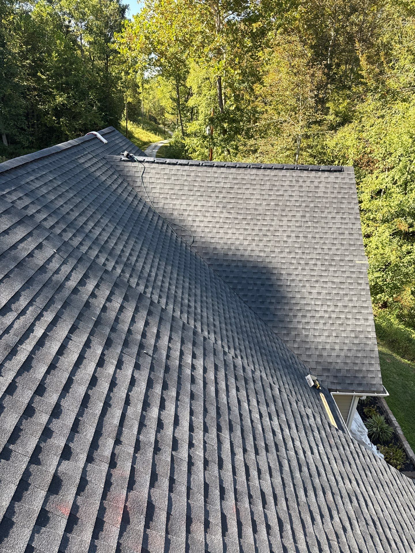 Residential Roofing Installation using GAF Timberline HDZ Charcoal by Rainstoppers Roofing