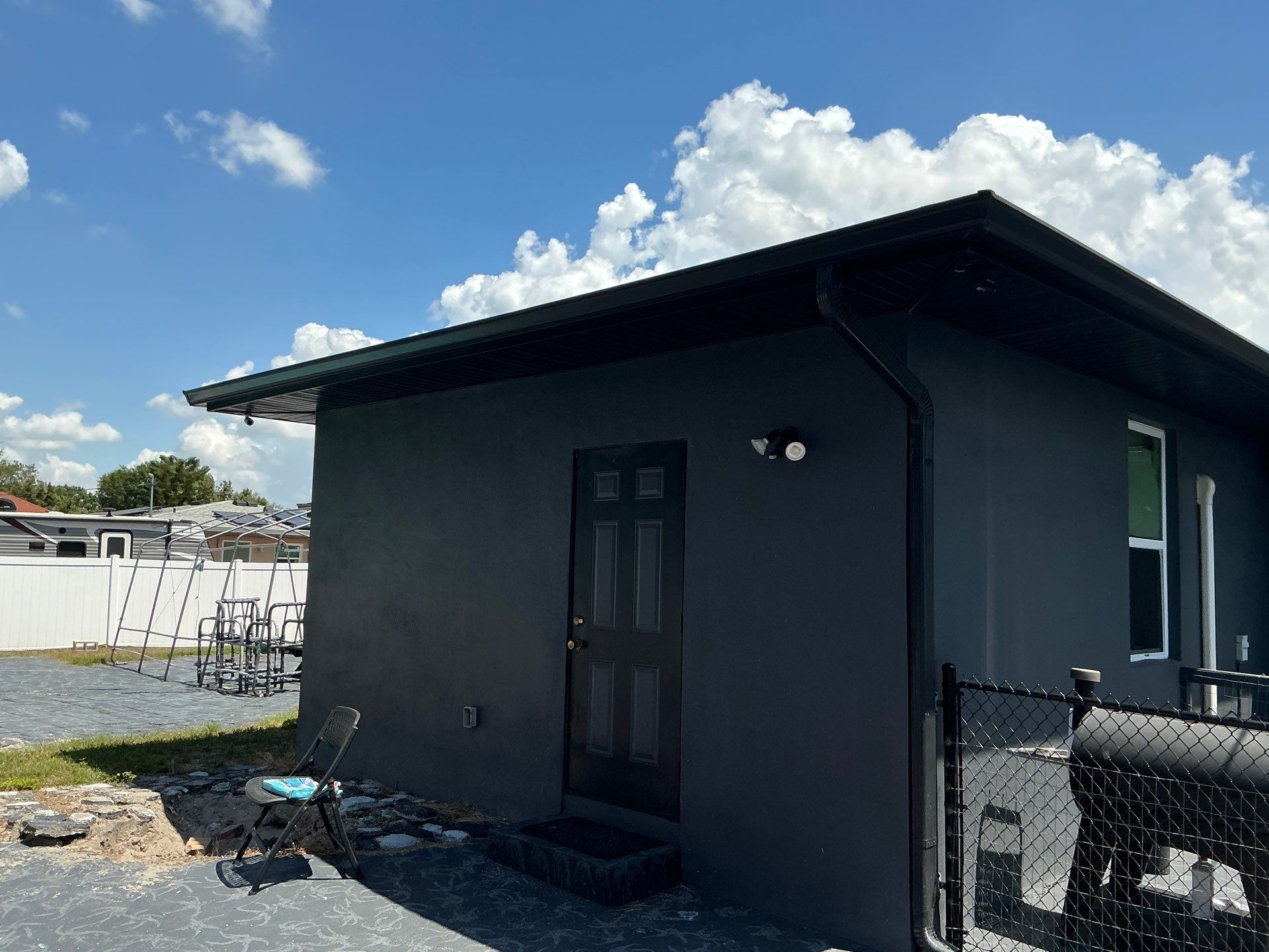 Black 7-Inch Gutters with Matching Downspouts in Fort Myers FL by Gutter Professor by Gutter Professors