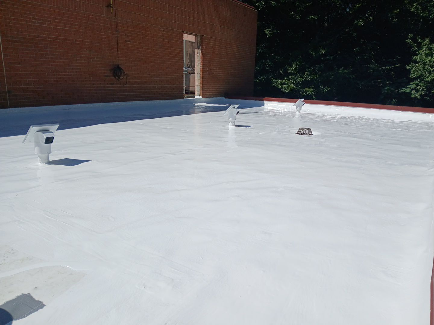 Roof Installation using Silicone TPO by ExteriorPros