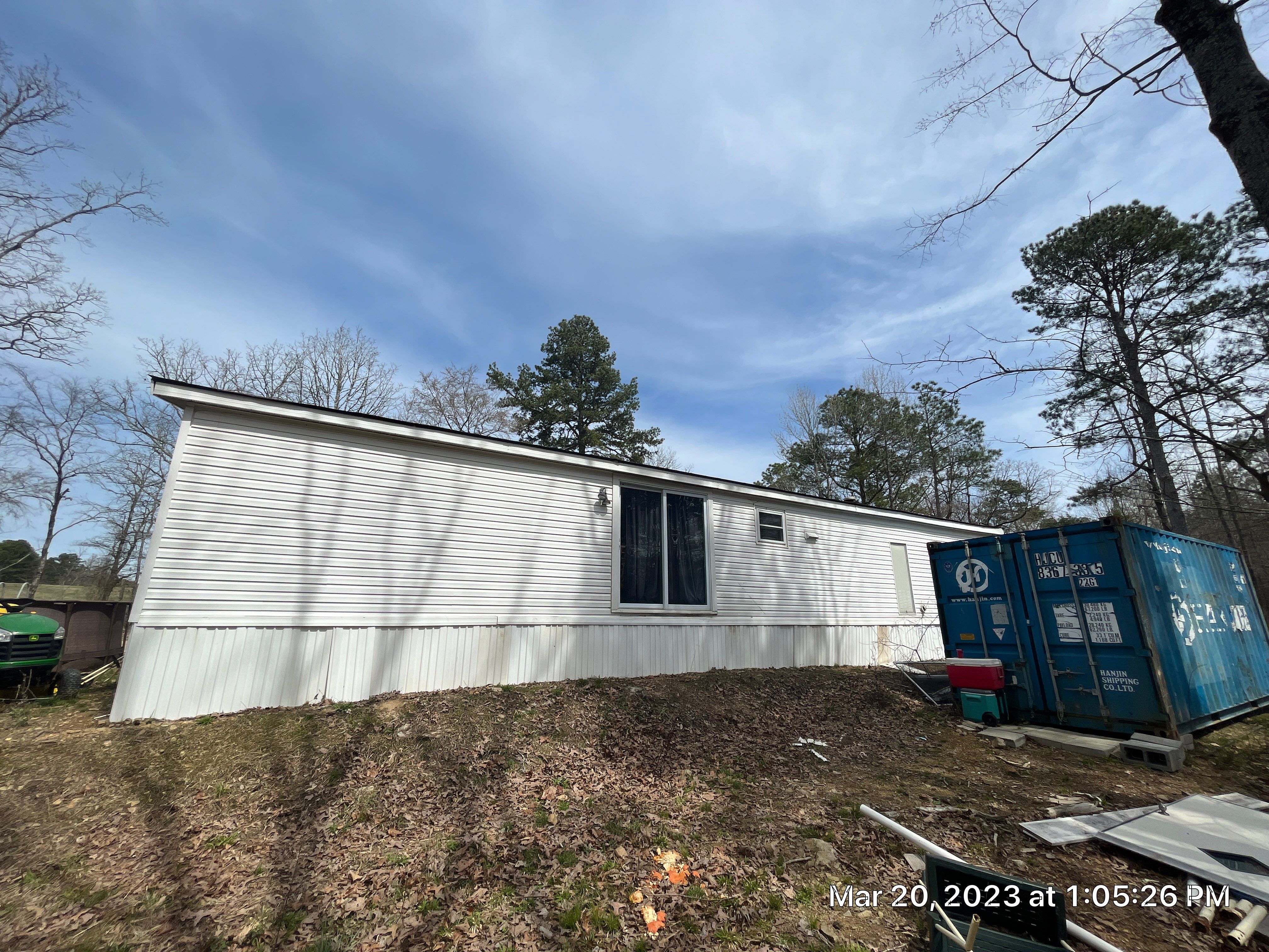 Residential Roofing Installation using 26 Gauge Colored Panels by Hostetler Roofing